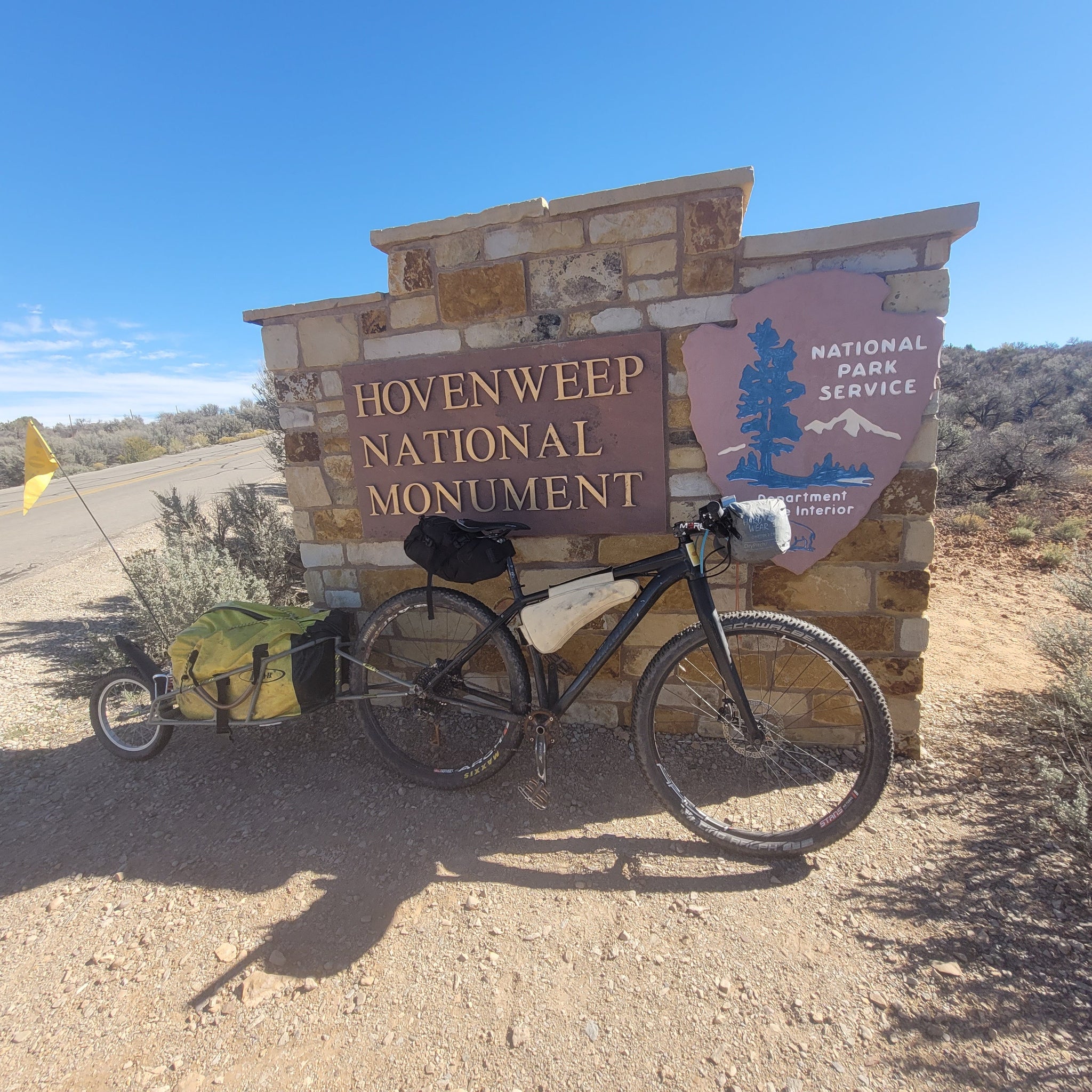 bike ready for bikepacking near hovenweep signage